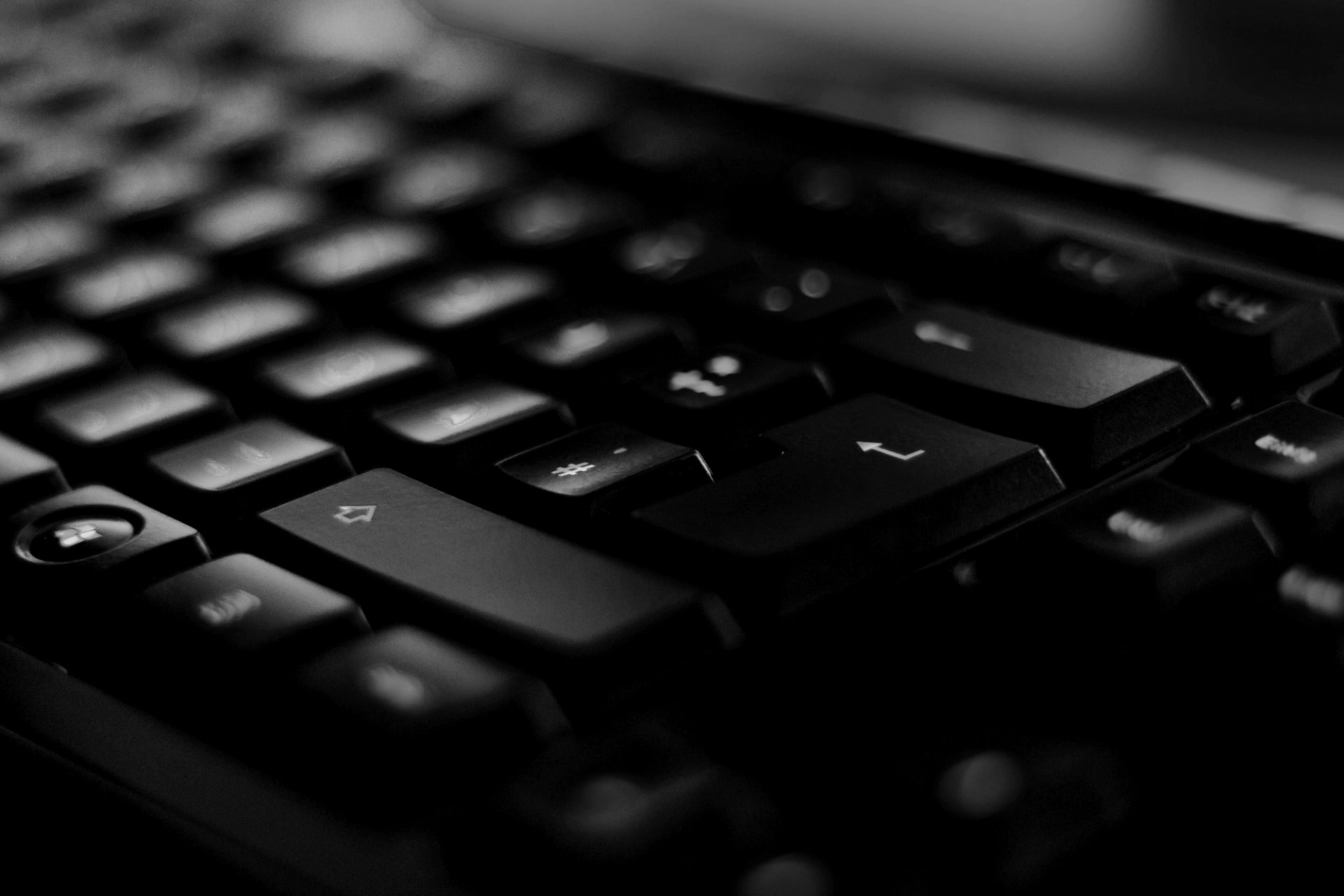 Backlit keyboard close-up in the dark