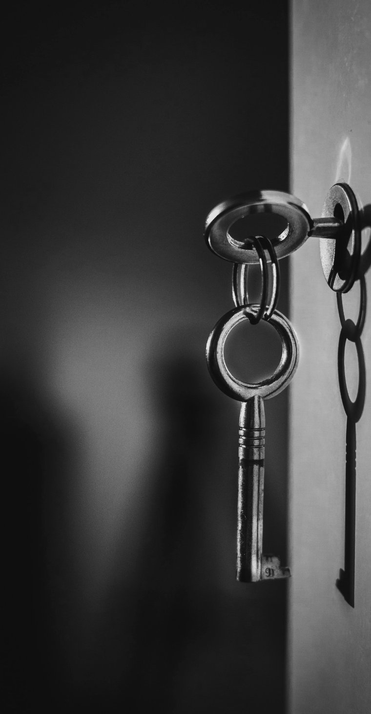 Key in a lock in shadow